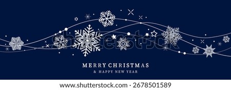 Christmas balls border isolated on a blue background. Christmas card with holidays decoration. Christmas snowflakes with stars border . Merry Christmas and Happy New Year background .