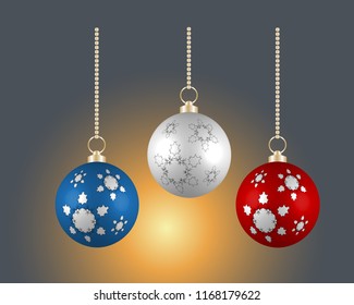 Christmas balls in different colors on dark background