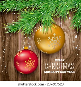 Christmas balls on wood background with fir twigs and snow. Vector illustration.