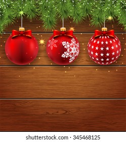 Christmas balls and pine branches on a wooden background. Illustration. Vector Eps10.
