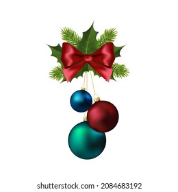 Christmas balls with red bow holly berries and pine tree branch