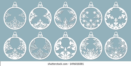 Christmas balls set with a snowflake cut out of paper. Templates for laser cutting, plotter cutting or printing. Festive background.