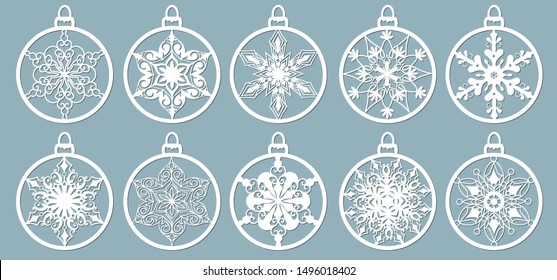 Christmas balls set with a snowflake cut out of paper. Templates for laser cutting, plotter cutting or printing. Festive background.