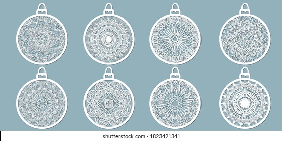 Christmas balls set with a snowflake cut out of paper. Templates for laser cutting, plotter cutting or printing. Festive background.
