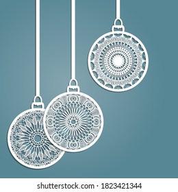 Bolas de Navidad con un copo de nieve cortado de papel. Plantillas para corte láser, corte de trazadores o impresión. Fondo festivo.