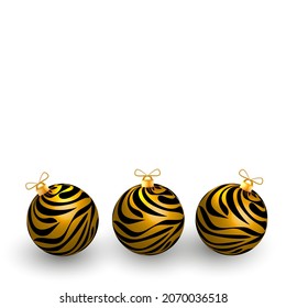 Christmas balls with tiger stripes. Symbol of the tiger year 2022. Realistic 3D Xmas balls. Vector illustration.