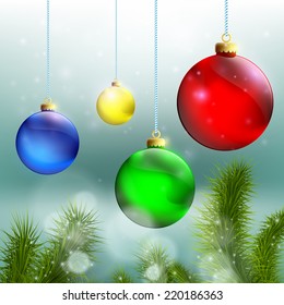 Christmas balls and Christmas tree on a background of snow-covered landscape
