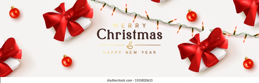 Christmas banner. Background Xmas design of sparkling lights garland, realistic gifts box, red ball. Holiday ornaments baubles, presents. Horizontal New Year poster, greeting card, headers for website