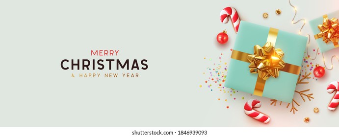 Christmas banner. Background Xmas design of realistic blue gifts box, 3d cane candy cookie, red bauble balls, golden glitter confetti. Horizontal christmas poster, greeting card, headers for website