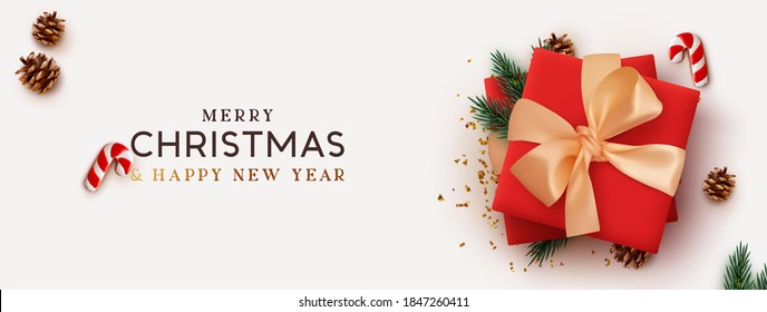 Christmas banner. Background Xmas design of realistic red gift box, 3d render pine branch and cone, sweet biscuit cane, gold confetti. Horizontal christmas poster, greeting card, headers for website