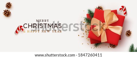 Christmas banner. Background Xmas design of realistic red gift box, 3d render pine branch and cone, sweet biscuit cane, gold confetti. Horizontal christmas poster, greeting card, headers for website