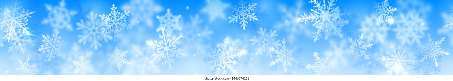 Christmas banner of complex blurred and clear snowflakes in white colors on light blue background. With horizontal repetition