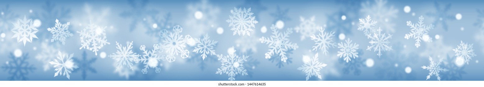 Christmas banner of complex blurred and clear snowflakes in white colors on light blue background. With horizontal repetition