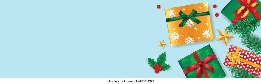 Christmas banner decorated with gift boxes, star, pine leaves and Christmas berries. Vector Illustration