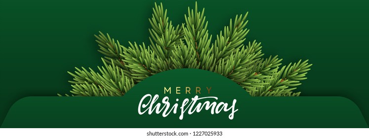 Christmas banner design with green realistic pine branches