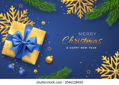 Christmas banner. Realistic gold gift box with blue bow, shining snowflake, gold stars, pine branches, confetti, balls. Xmas background, horizontal poster, greeting cards, headers website. Vector.