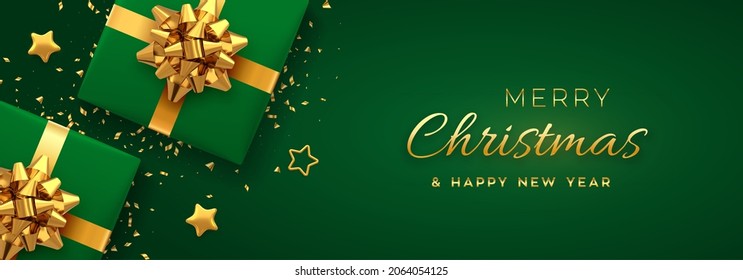 Christmas banner. Realistic green gift boxes with golden bow, gold stars and glitter confetti. Xmas background, horizontal christmas poster, greeting cards, headers website. Vector illustration.