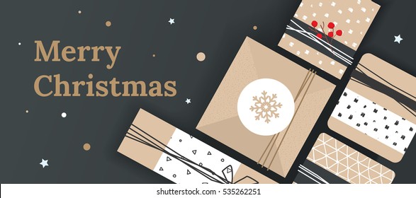 Christmas banner for the store. The poster with presents and space for text. Festive box on the table, top view.