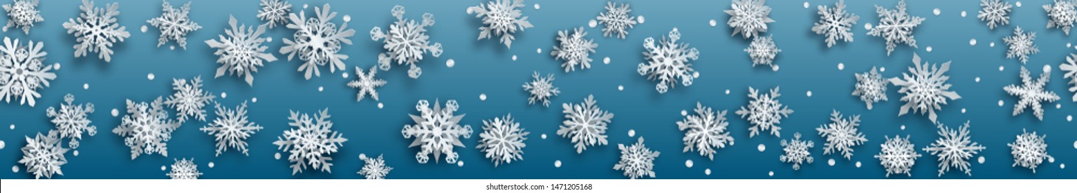 Christmas banner of white complex paper snowflakes with soft shadows on light blue background. With horizontal repetition