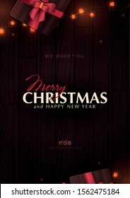 Christmas banner. Wooden Xmas Background design of sparkling lights garland, with gifts box. New Year Poster, greeting cards, headers, website