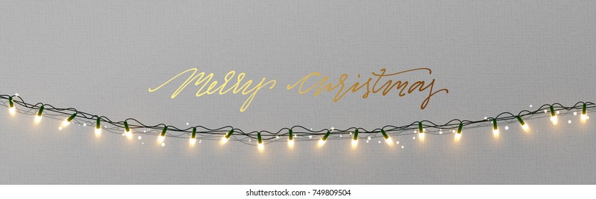 Christmas banner, Xmas sparkling lights garland, posters, cards, headers website.