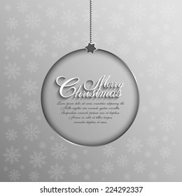 Christmas bauble on patterned background