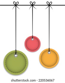 Christmas baubles tied with bows. Colorful leather labels. Vector illustration