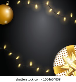 Christmas blank with empty space for your text. Luxury template with composition of festive elements like shiny Christmas decorations, sparkling lights garland and gift