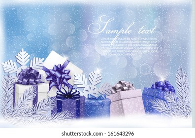 Christmas blue background with gift boxes and snowflakes. Vector
