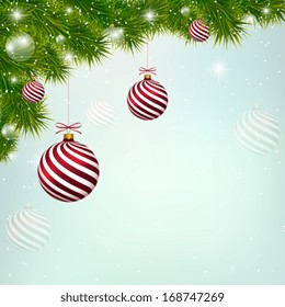 Christmas blue background with red New Year balls. Festive snowy frame with  fir twigs and twinkling stars