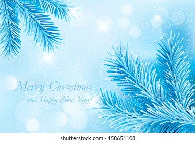 Christmas blue background with christmas tree branches and snowflakes.