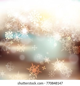 Christmas blurred background with bokeh light and snowflakes for design