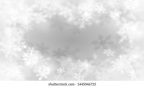 Christmas blurred background with frame of complex defocused big and small snowflakes in white and gray colors with bokeh effect