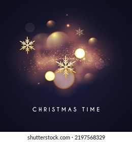 Christmas bokeh light effect with gold sowflakes