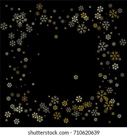 Christmas border or frame with random scatter falling golden snowflakes isolated on black.