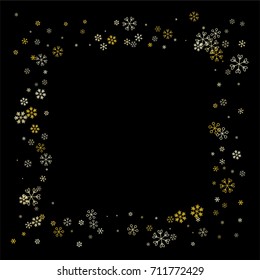 Christmas border or frame with random scatter falling golden snowflakes isolated on black.