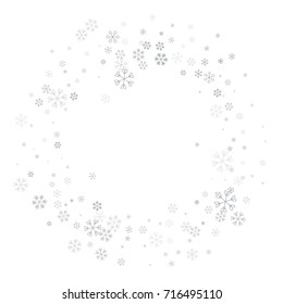 Christmas border or frame with random scatter falling silver snowflakes isolated on white.