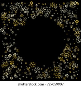 Christmas border or frame with random scatter falling golden snowflakes isolated on black.