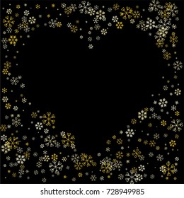 Christmas border or frame with random scatter falling golden snowflakes isolated on black.