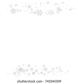 Christmas border or frame with random scatter falling silver snowflakes isolated on white.