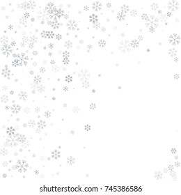 Christmas border or frame with random scatter falling silver snowflakes isolated on white
