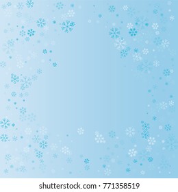 Christmas border or frame with random scatter falling blue snowflakes on a blue background.