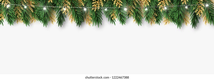 Christmas border green and golden pine branches light garlands