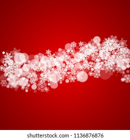 Christmas border with white snowflakes on red background. Santa colors and mood. Merry Christmas border for season sales, banners, invitations, retail offers. Falling snow. Frosty winter backdrop.