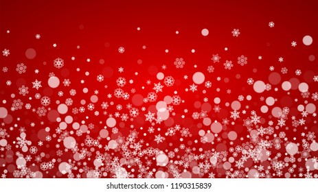 Christmas border with white snowflakes on red background. Santa Claus colors. Horizontal Merry Christmas border for season sales, banners, invitations, retail offers. Falling snow. Frosty winter back.