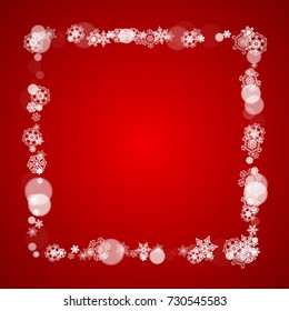 Christmas border with white snowflakes on red background. Santa colors and mood. Merry Christmas border for season sales, banners, invitations, retail offers. Falling snow. Frosty winter backdrop.