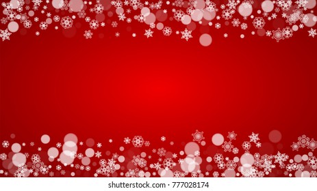 Christmas border with white snowflakes on red background. Santa Claus colors. Horizontal Merry Christmas border for season sales, banners, invitations, retail offers. Falling snow. Frosty winter back.