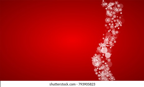 Christmas border with white snowflakes on red background. Santa Claus colors. Horizontal Merry Christmas border for season sales, banners, invitations, retail offers. Falling snow. Frosty winter back.