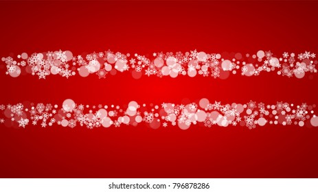 Christmas border with white snowflakes on red background. Santa Claus colors. Horizontal Merry Christmas border for season sales, banners, invitations, retail offers. Falling snow. Frosty winter back.