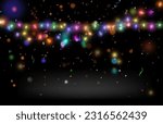 Christmas bright, beautiful lights, design elements. Glowing lights for design of Xmas greeting cards. Garlands, light Christmas decorations.